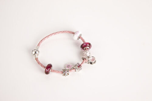 A Sterling Silver and Pink Leather Pandora Bracelet