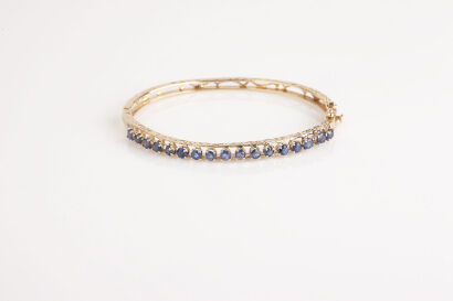 A 14ct Gold Sapphire Bangle