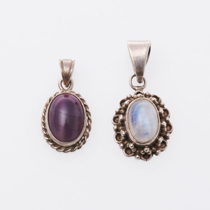 Two Silver Pendants