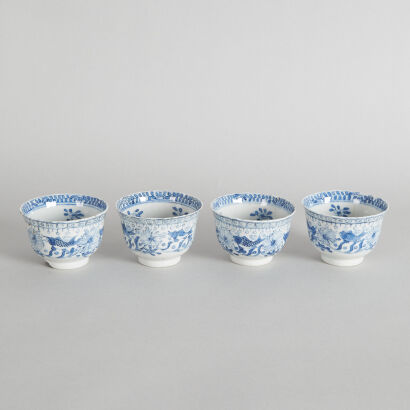 Four 19th Century Chinese Blue and White 'Fish' Cups (Kangxi Nian Zhi Mark, chipped)