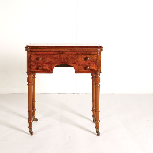 A Burr Walnut Card Table with Turned Legs