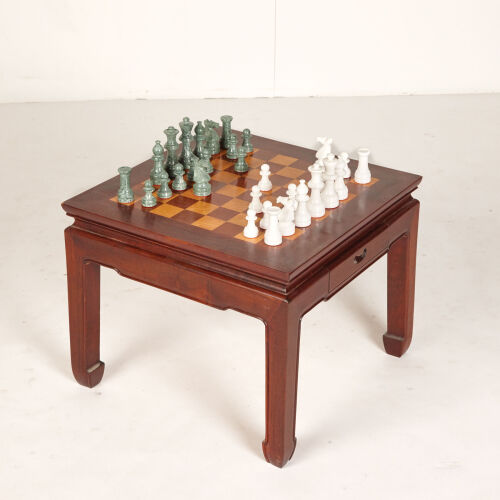 A Low Chess Table with Marble Chess Pieces