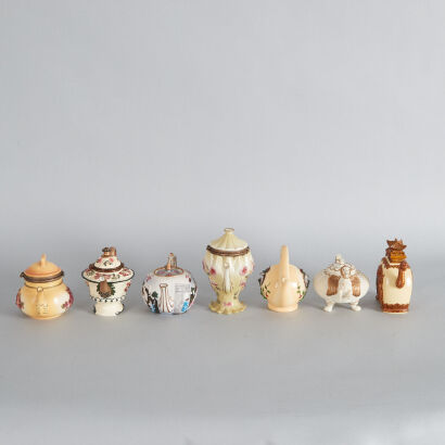 A Collection of Seven Nini Mini Teapots