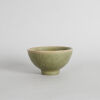A Chinese Incised Celadon-Glazed 'Twin Fish' Bowl