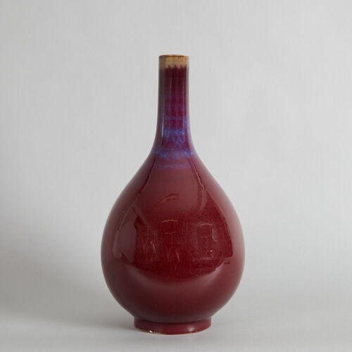 A Chinese Flambe-Glazed Bottle Vase (Da Qing Xianfeng Nian Zhi Mark)