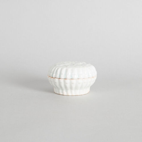 A Chinese Qingbai 'Chrysanthemum' Lidded Box
