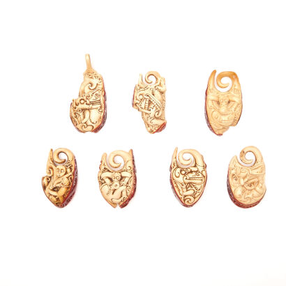 Seven Hornbill Bird Carvings, Red-Crowned Bone Carvings