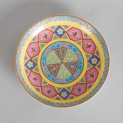 A Chinese Yellow-Ground Famille Rose 'Floral' Saucer (Da Qing Yongzheng Nian Zhi Mark)
