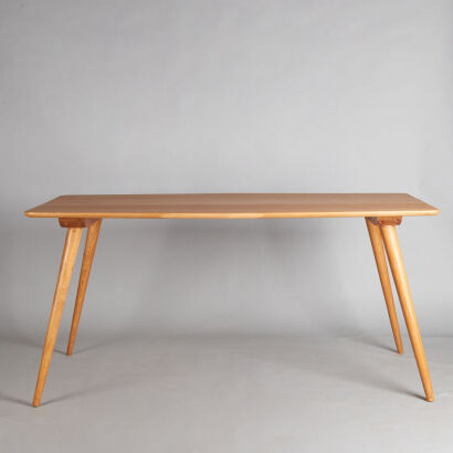 A Mid-Century Bob Roukema Solid Oak Dining Table