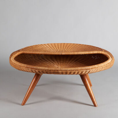 An Organic Formed Woven Cane Coffee Table