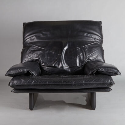 A Vintage 1980s Italian Leather Single Seater Sofa.