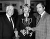 PHOTOGRAPHER UNKNOWN Tom Clark and Peter Blake with The Henri-Lloyd Challenge Trophy