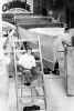 PHOTOGRAPHER UNKNOWN Peter Blake beside the unfinished hull of his racing trimaran Steinlager One