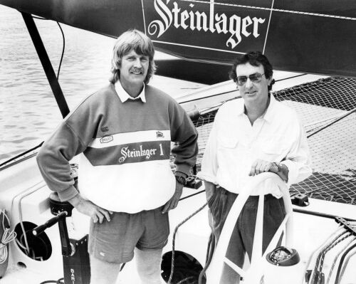PHOTOGRAPHER UNKNOWN Touring Pink Floyd drummer Nick Mason and Peter Blake aboard Steinlager One, moored at Marsden Wharf