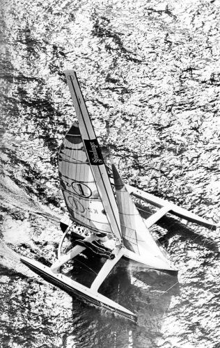 PHOTOGRAPHER UNKNOWN Steinlager One sails toward the finish line of the Transfield two-handed yacht race in Auckland Harbour