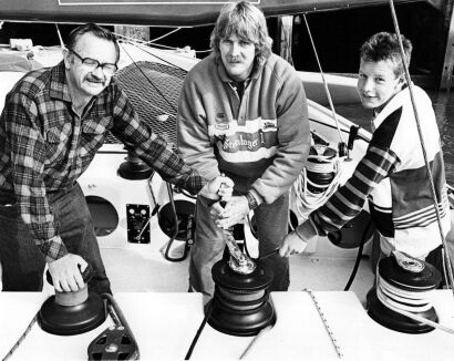PHOTOGRAPHER UNKNOWN Skipper Peter Blake with Barry and Richard Taylor aboard Steinlager One