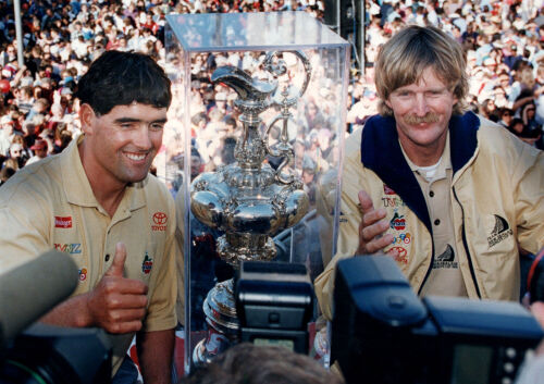 PHOTOGRAPHER UNKNOWN Peter Blake receiving the America's Cup trophy after a resounding victory