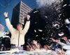 MELANIE BURFORD Peter Blake celebrates at the America's Cup parade