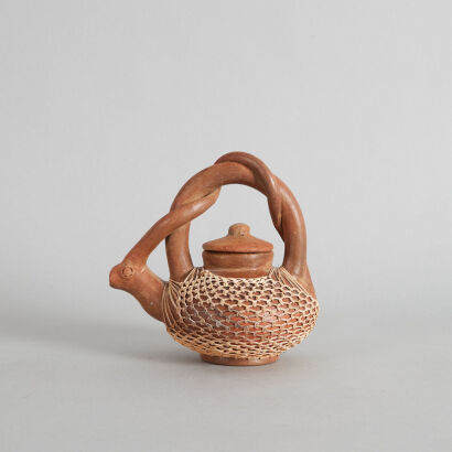 A Red Clay Teapot with Flax Weaving Outer