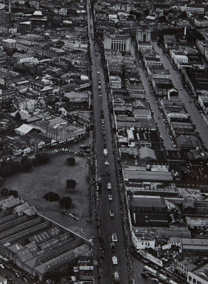 VICTOR C. BROWNE Parade Passing through South Island Town