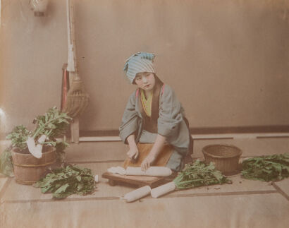 PHOTOGRAPHER UNKNOWN Woman Preparing Meal