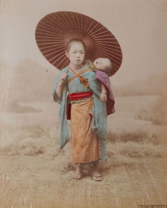 PHOTOGRAPHER UNKNOWN Young Nurse with Baby on Back