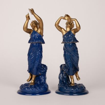 A Pair of Royal Worcester Crown Ware Figurines