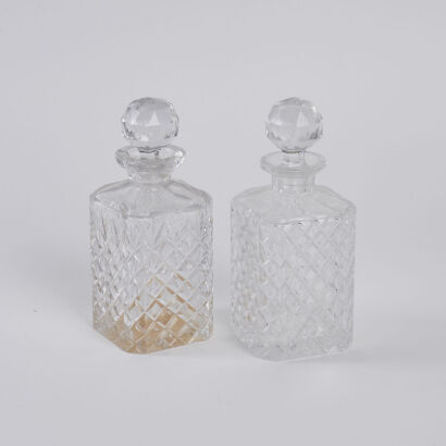 A Pair Of Glass Decanters