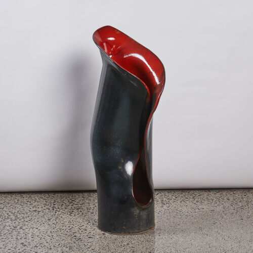 A Red and Black Lily Sculpture