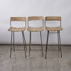 A Set of Three High Back Rattan Bar Stools