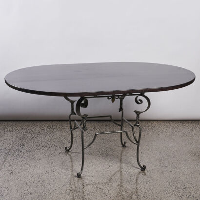 A Iron Based and Wooden Topped Dining Table