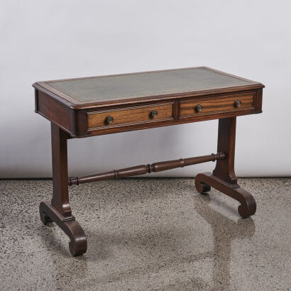 A Green Leather Topped Mahagony Writing Desk