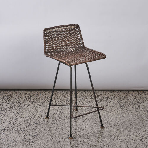 A Brown Rattan Lowback Bar Stool
