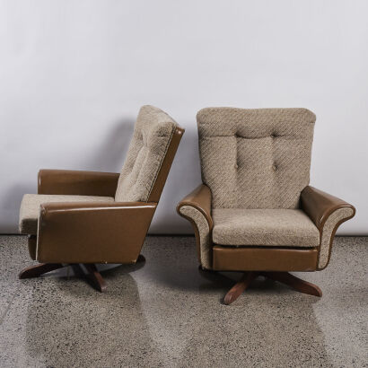 A Pair Of Mid-Century Reclining Swivel Chairs