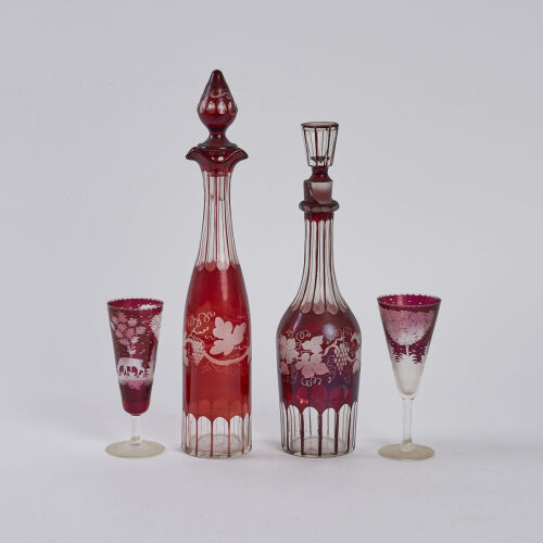 A Collection of Bohemian Etched Ruby Glass Items