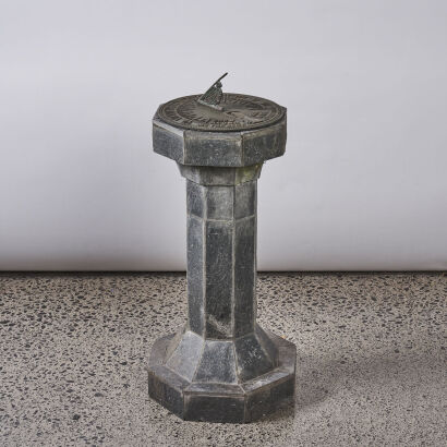 A Granite And Bronze Sundial