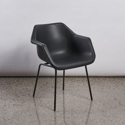 A Black Plastic Occasional Chair