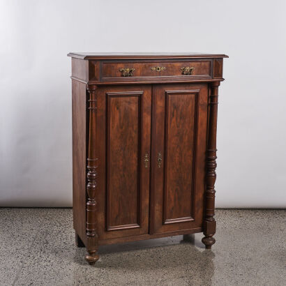 A Fine Antique Flame Mahagony Cabinet