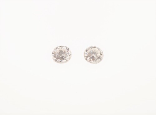 A Pair of Loose 0.61ct Round Brilliant Cut Diamonds