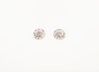 A Pair of Loose 0.61ct Round Brilliant Cut Diamonds