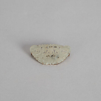 A Chinese White Jade 'Butterfly' Brooch carved with longevity and fortune