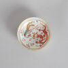 A Chinese Famille Rose and Iron-Red 'Dragon and Phoenix' Saucer (Da Qing Xuantong Nian Zhi Mark)