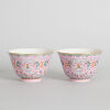 A Pair of Chinese Pink-Ground Famille Rose 'Longevity' Bowls (Da Qing Tongzhi Nian Zhi Mark)