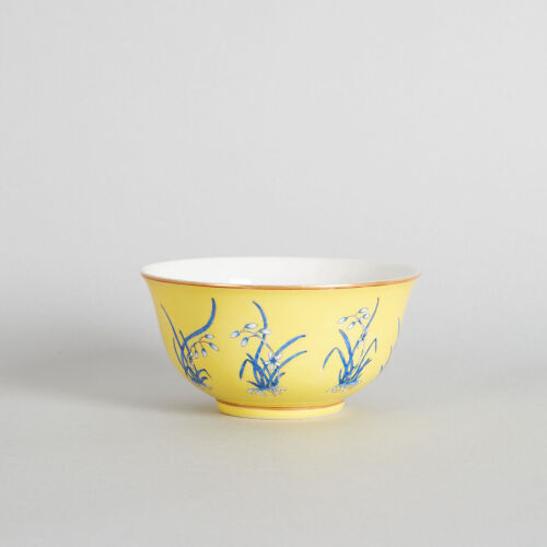 A Chinese Yellow-Ground Blue-Enamelled 'Floral' Bowl (Tongzhi Nian Zhi Mark)