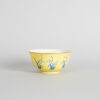 A Chinese Yellow-Ground Blue-Enamelled 'Floral' Bowl (Tongzhi Nian Zhi Mark)