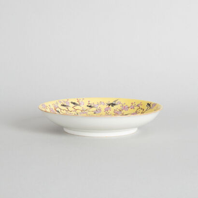 A Chinese Yellow-Ground Famille Rose 'Magpie and Prunus' Dish (Da Qing Guangxu Nian Zhi Mark)