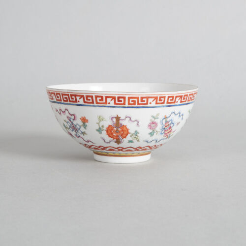 A Chinese Famille Rose 'Eight Auspicious Emblems' Bowl (Da Qing Guangxu Nian Zhi Mark)