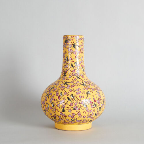 A Chinese Yellow-ground Famille Rose 'Magpie and Prunus' Bottle Vase (Da Qing Guangxu Nian Zhi Mark)