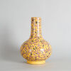 A Chinese Yellow-ground Famille Rose 'Magpie and Prunus' Bottle Vase (Da Qing Guangxu Nian Zhi Mark)