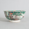 A Chinese Mid-Qing Dynasty Famille Verte 'Farming' Bowl